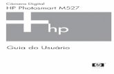 Câmera Digital HP Photosmart M527h10032.2. Insira o cartão de memória opcional na menor abertura, como mostrado. Verifique se o cartão de memória está fixo no lugar. 3. Feche